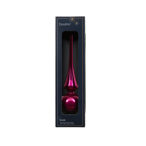Eine glänzende magentafarbene glass baumspitze mit schlanker form und reflektierender oberfläche