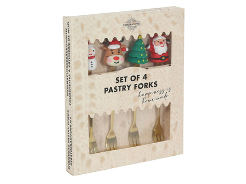 Set of four gold-toned 13cm festive pastry forks with christmas figurines in a cream box for weihnachten