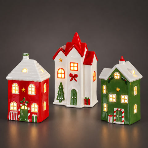 Drei festliche led haus porzellan weihnachtsdorf häuser mit leuchtenden fenstern und dekor in rot weiß grün