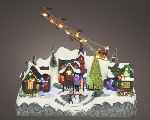 LED Szene Santa über Stadt bunt 32x17x27.5cm
