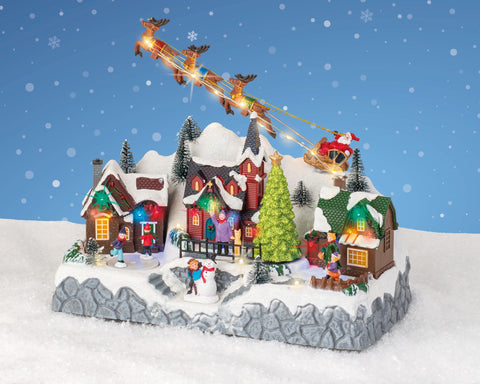 LED Szene Santa über Stadt bunt 32x17x27.5cm