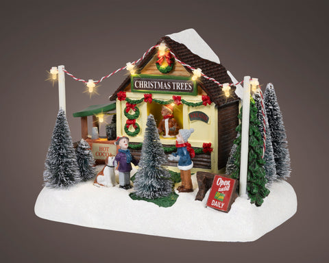 Led szene baumverkauf diorama mit warmweißen led lichter, schneebedeckten bäumen und miniaturfiguren