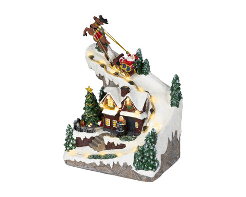 Led szene santa hebt ab warmweiße led beleuchtete weihnachtsfigur mit santa im schlitten über schneebedeckte berge