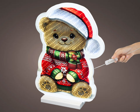 Led infinity bär bunt weihnachtliche leuchtfigur mit rotem und silbernem weihnachtsmütze und grün-rotem pullover