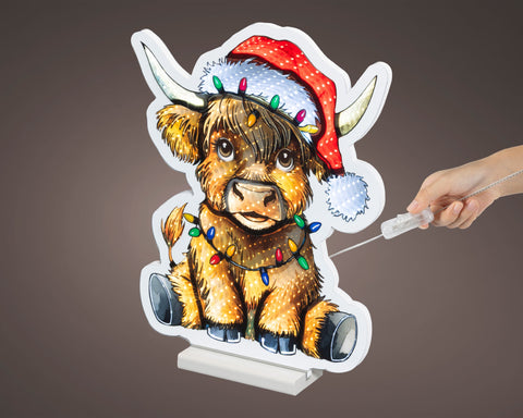 Festlicher led infinity büffel in bunt mit rotem santa-hut und weihnachtslichtern 1.3x31x39.5cm