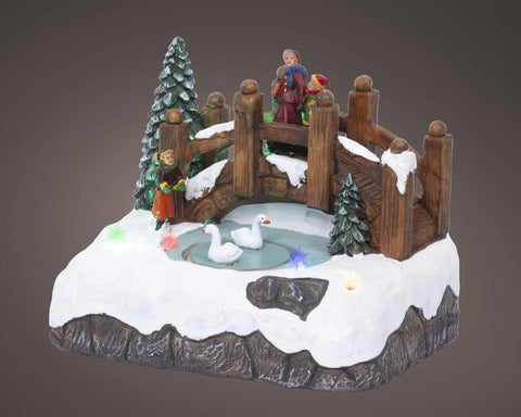 Led szene brücke winterliche diorama figur mit holzbrücke, weißen gänsen auf eisigem wasser und festlicher dekoration