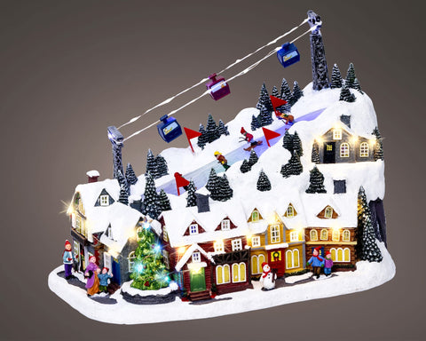 Micro led szene polyresin flash effekt mit beleuchteter miniatur skipiste schnee bedeckte häuser weihnachtsbaum und seilbahnen innenbereich