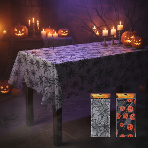 Weiße tischdecke halloween 140x270cm mit schwarzem spinnennetzmuster neben orangefarbenen kürbismustern
