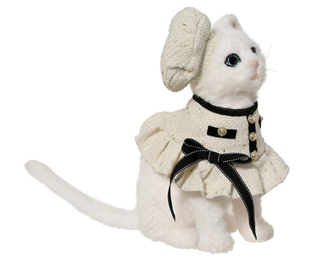 Weiße katze fell figurine 24x17x40cm in einem elfenbeinfarbenen tweedjackett mit schwarzem saum und goldenen knöpfen