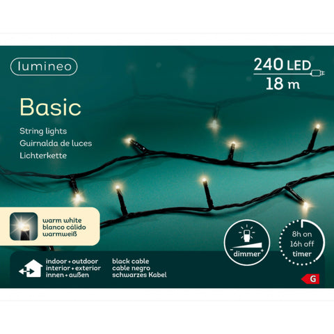 Eine 240 led-lichterkette basic schwarz warmweiß mit flexiblem draht in zwei kaskaden hängend vor neutralem hintergrund