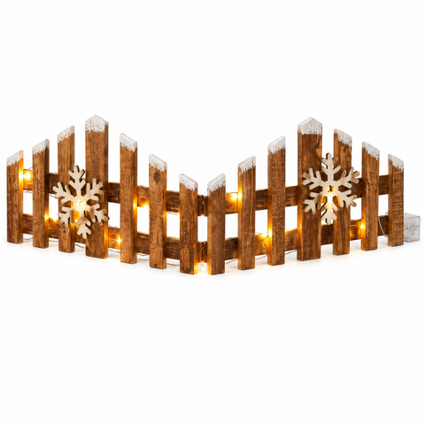 Warmtoniger holzzaun 20cm mit schneeflockenausschnitten und leuchtenden led-lichtern als dekoration