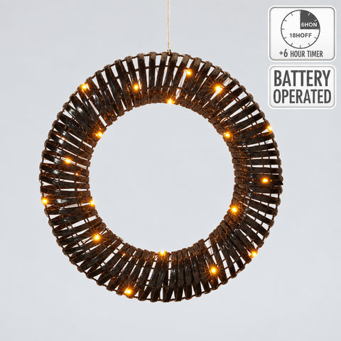 Kranz 40cm mit led schwarz schwarzer geflochtener rundlicher leuchtenkörper mit warm leuchtenden led glühbirnen