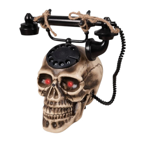 Schwarzes rotary-telefon auf beigem schädel mit leuchtenden roten augen im produkt schädel als telefon mit licht und sound