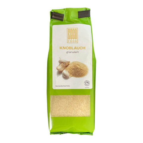 Grünes paket granulierter knoblauch von eco food marke für aromatisches würzen und kochen