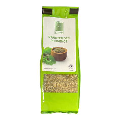 Ein leuchtend grüner beutel von eco food mit kräutern der provence 25g und sichtbarem fenster mit getrockneten kräutern