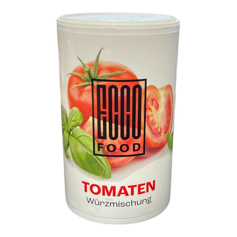 Weißer zylinderförmiger behälter mit coco food tomaten würzmischung 125g und abbildung von roten tomaten und grünem basilikum