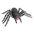 Schwarze latex spinne mit roten zähnen und weiß gestreiften beinen 46x28 cm spielzeug tarantel