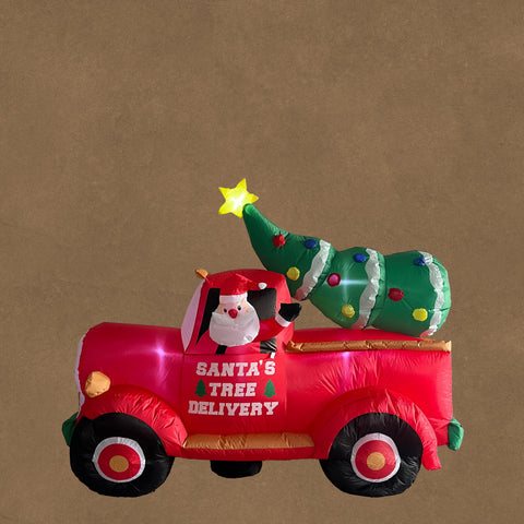 Aufblasbarer roter lastwagen mit led santa claus fahrer und weihnachtsbaum ladung mit text santas tree delivery