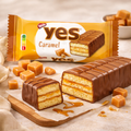 Ein goldenbrauner nestlé yes kuchenriegel karamell mit karamellfüllung und milchschokoladenüberzug