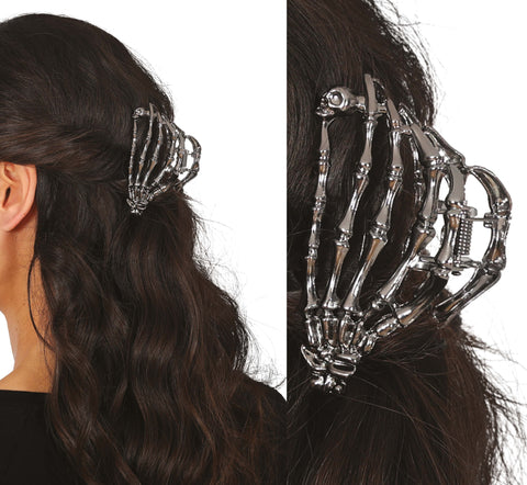 Metall-haarspange skeletthand mit artikulierten fingern aus silbernem metall und federmechanismus