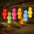 Colorful lumineo solar laterne 28x58cm with illuminated double-gourd paper lanterns hanging from tree branches