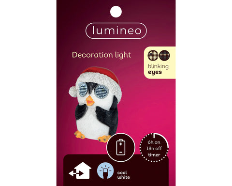 Led pinguin von lumineo mit blinkenden augen und rotem santahut aus schwarzem und weißem kunststoff für außenbereich