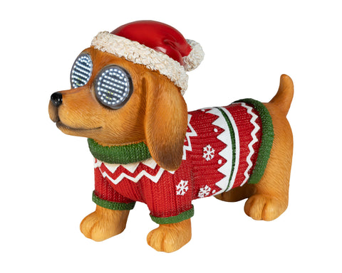Ein brauner led dachshund außen mit rot grünem festtags-pullover und santa-hut 9,5x21x15,5cm