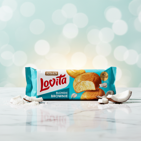 Teal und weiß verpackter lovita blondie brownie kokosgeschmack von roshen mit bild von brownies und kokosraspeln