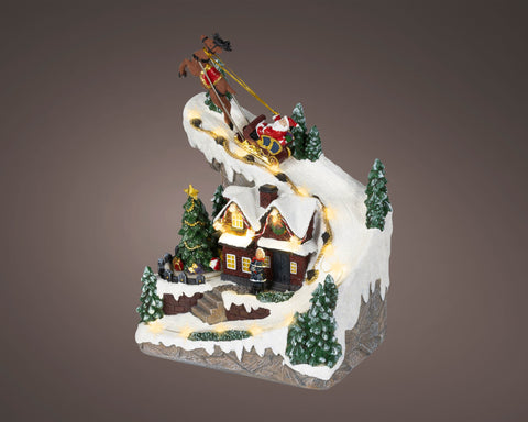 Led szene santa hebt ab mit rot beleuchtetem schlitten, weihnachtsmann, braunem rentier und schneelandschaft
