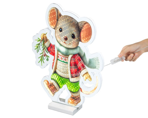 Ein led infinity maus figur beleuchtet in rot kariertem pullover und grüner hose mit eingebetteten led-lichtern