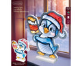 Ein festlicher blauer led infinity pinguin mit rotem weihnachtsmütze und weißen punkten hält ein eis am stiel