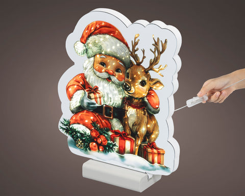 Ein festliches led infinity rentier und santa weihnachtsschild mit warmweißen leds in klassischer saisonaler optik
