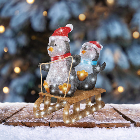 LED Pinguin auf Schlitten Acryl Outdoor kaltweiße LED 61.5x31x56.5cm