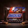A package of twelve snickers minis 227g in a glossy brown and red wrapper with the blue snickers logo