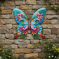 Bunter metallschmetterling wandaufhänger mit blumenaufdruck und dekorativen wirbeln 30x33cm