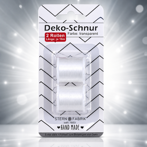 Zwei transparente spulen deko-schnur 16m in schwarz-weißem chevron-muster verpackt