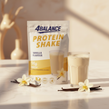 4balance protein shake vanilla 120g in weiß und gelb mit klarem bild des shakes auf der vorderseite