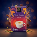 Eine lebendige lila und rote box bardollini vanilla chai latte 100g mit tiger und elefant illustration