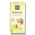 Ein blassgrüner rechteckiger weißer schokoladenriegel mit matcha und süßstoff in einer verpackung mit kirschblütenmotiven von bardollini
