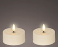 Zwei beige solarkerzen 7x7x3,2 cm led teelichter mit warm leuchtender flamme im 2er set