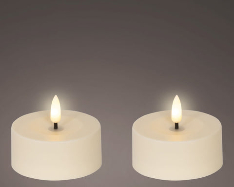 Zwei beige solarkerzen 7x7x3,2 cm led teelichter mit warm leuchtender flamme im 2er set