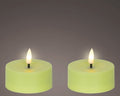Zwei leuchtend limonengrüne led-teelichter solarkerze 7x7x3,2 cm mit realistischen flammenlichtern