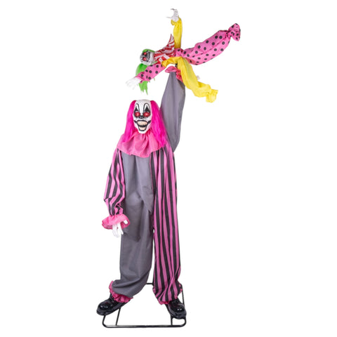 Clown hält kleinen Clown in die Luft