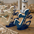 Two nautische metall-anker blau/creme buchstützen in creme mit blauem sockel und ganz in marineblau aus holz oder harz
