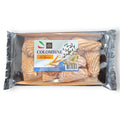 Eine packung colombine il classica 150g mit goldbraunen, gerillten keksen, bestäubt mit puderzucker im klaren foliepaket