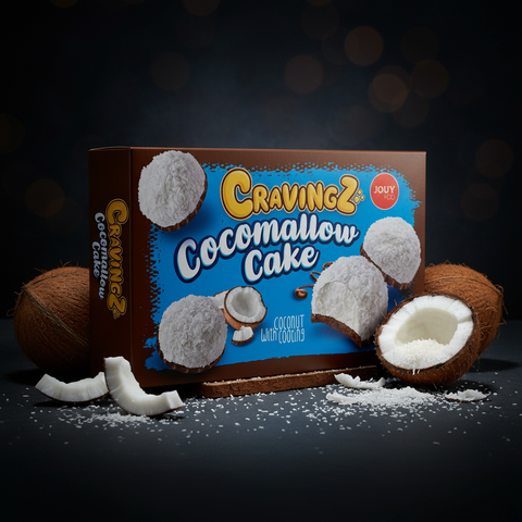 Braune und blaue box mit cravingz cocomallow kuchen 100g und kokosnussgrafiken auf der verpackung