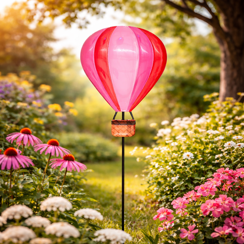 Ein metall gartenstecker heiluftballon 65x18 cm in rosa mit lebendigem pink-rot und geflochtenem korbständer