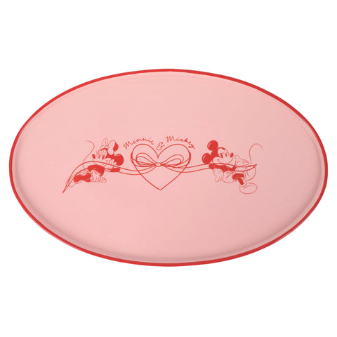 Rosa ovale servierplatte mit rotem rand und zentralem minnie und mickey maus design für liebevolle anlässe