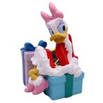 3d figur daisy mit geschenk 19 4 cm rosa federente in rotem santa outfit auf blauen und lila geschenkboxen