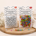 Zwei pakete bunter buchstaben bastelperlen von stern fabrik aus kunststoff zum gestalten mit 20g gewicht